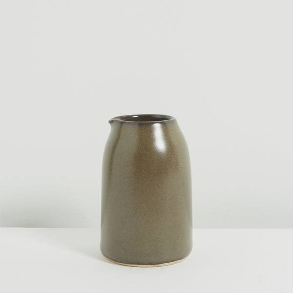 Small charcoal clay milk jug
