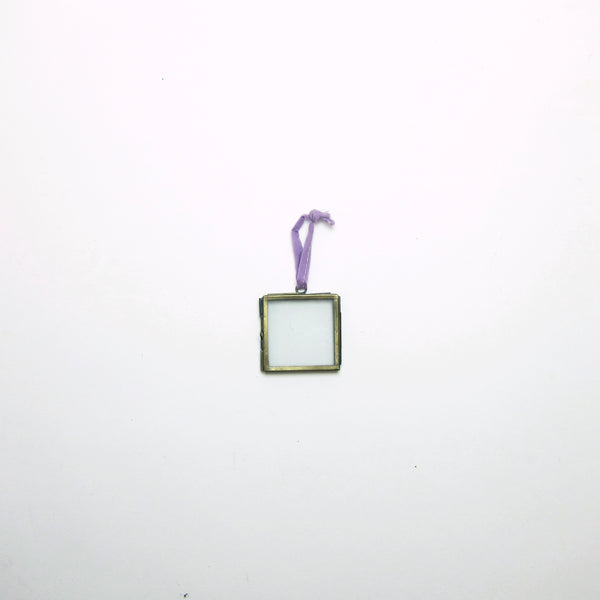 Small glass hanging frame.