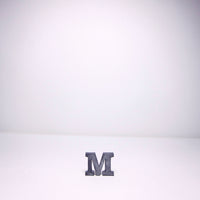 Small metal M