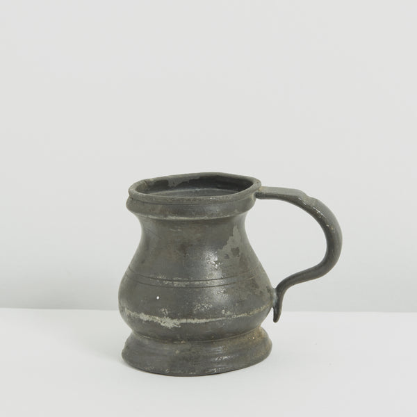 Tiny pewter cup