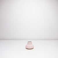 Small unglazed pink vase