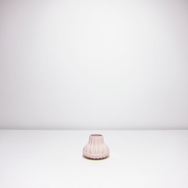 Small unglazed pink vase