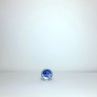 Small round blue + whites plates