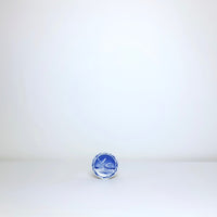 Small round blue + whites plates