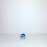 Small round blue + whites plates