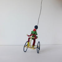 Toy Boy on bike