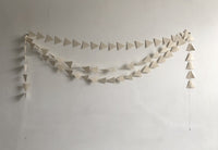 Triangle paper beads.