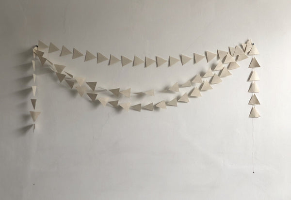 Triangle paper beads.