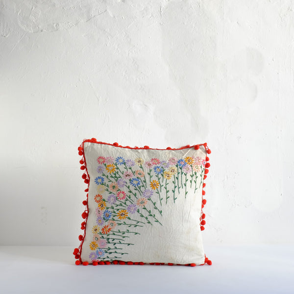 Vintage embroidered floral cushion