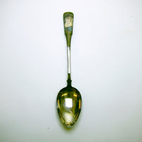 Large silver spoon