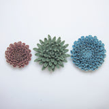 Ceramic wall hung flowers