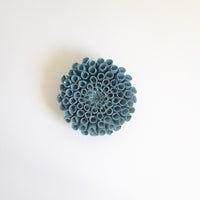 Ceramic wall hung flowers