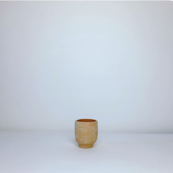 Washed terracotta cup