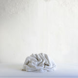 White cotton cable knit blanket