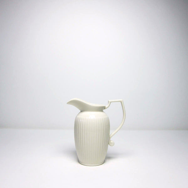 Tall cream china jug