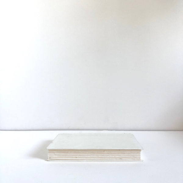 White hardback book
