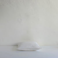 White textured linen cushion