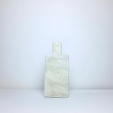 White marble board with handle