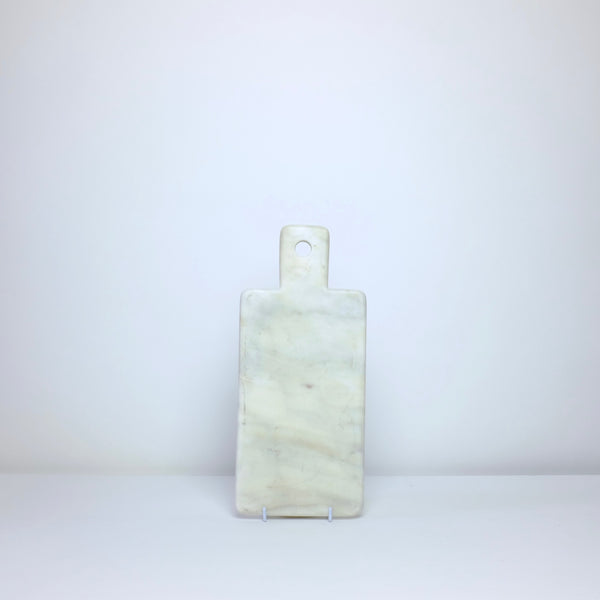 White marble board with handle