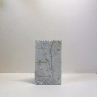 White marble plinth
