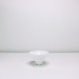 Low milk glass funnel shaped bowl 