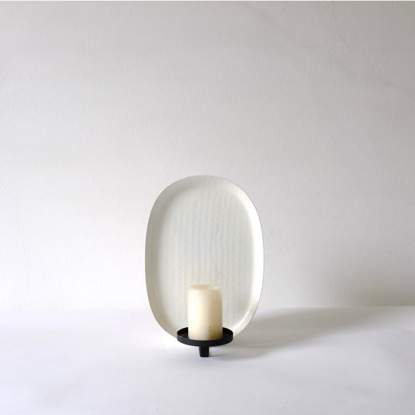 White oval wall sconce