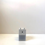 White plastic pencil sharpener