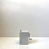 White plastic pencil sharpener