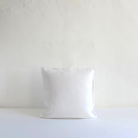 White textured linen cushion