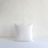 White textured linen cushion