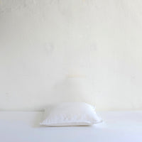 White textured linen cushion