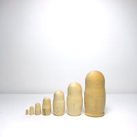 Natural wood Russian doll set