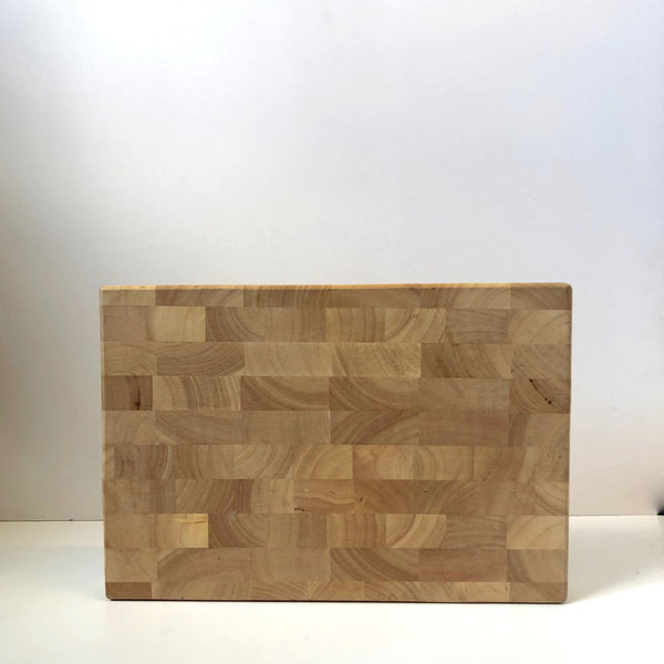 Thick wooden chopping board