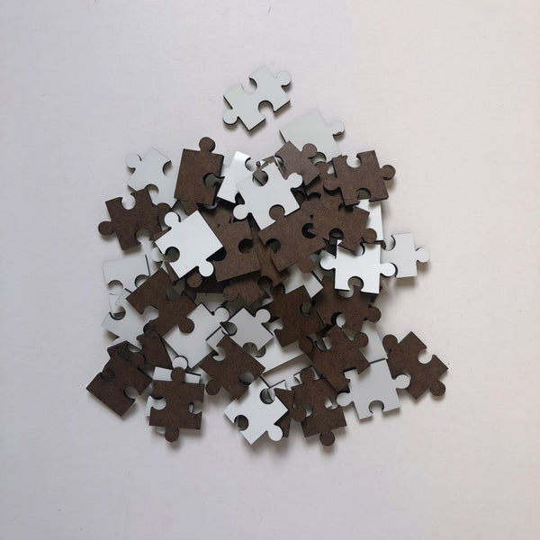 Reversible wood + white jigsaw pieces