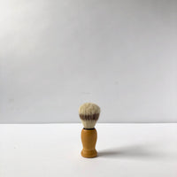 Wood shaving brush