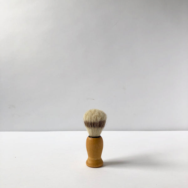 Wood shaving brush