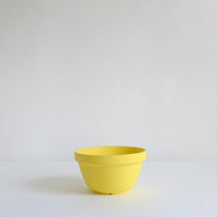 Yellow painted mixing bowl