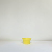 Yellow cardboard bowl