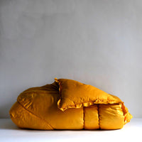 Yellow vintage satin eiderdown