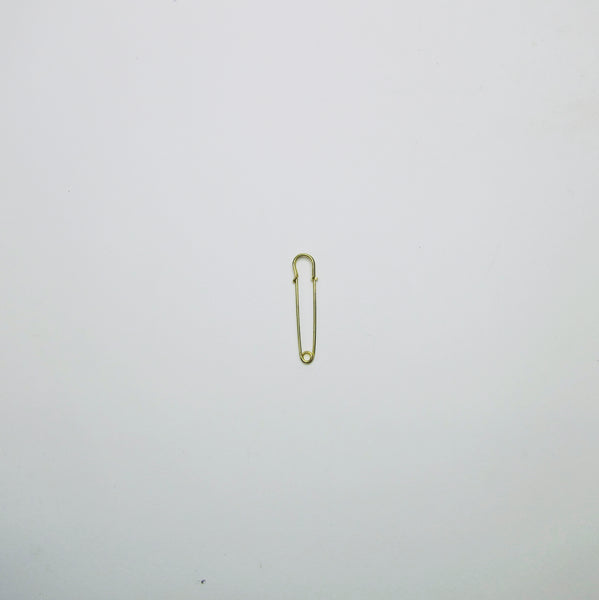 Gold kilt pin