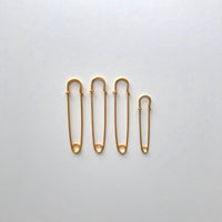 Gold kilt pin