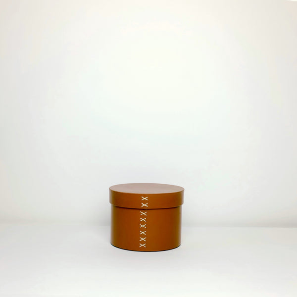 Round leather stitched box