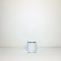 Plain white paint tins
