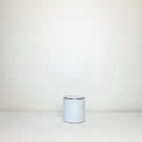 Plain white paint tins