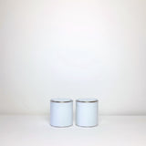 Plain white paint tins