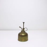 Old brass spray can