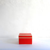 Red box with white trim