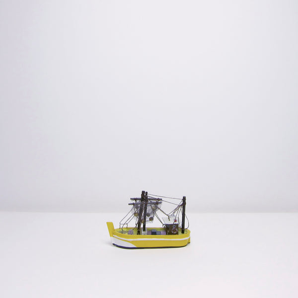 Yellow toy wood boat